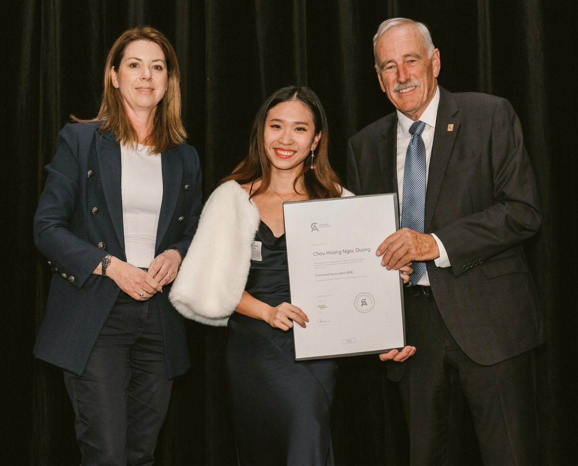 Catarina Duong on stage receiving her Chartered Accountant certificate in 2025